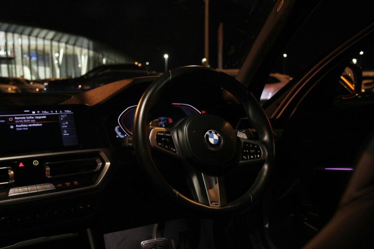 The interior of a car at night with a dashboard — illustrative photography