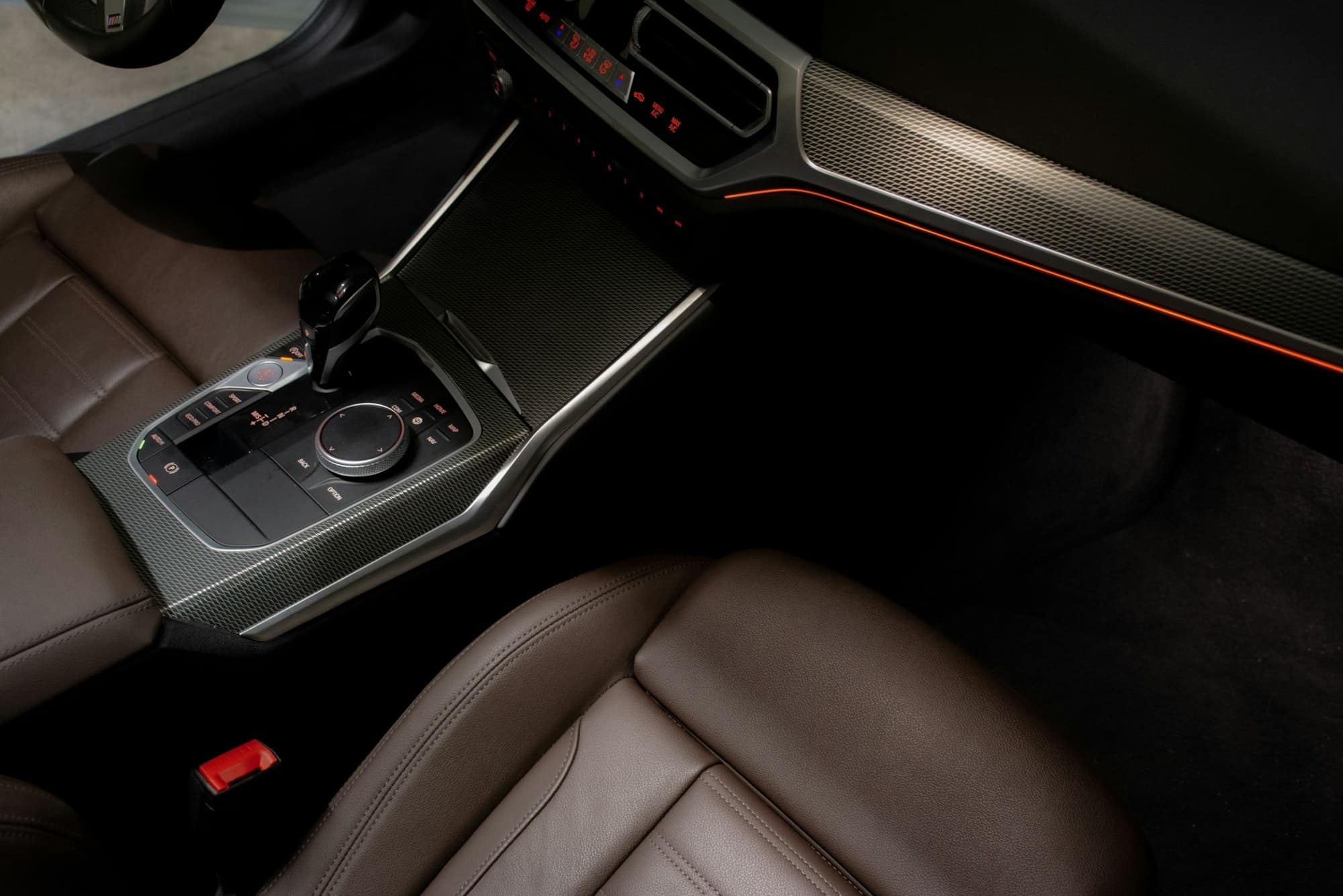 The interior of a modern car with leather seats — illustrative photography