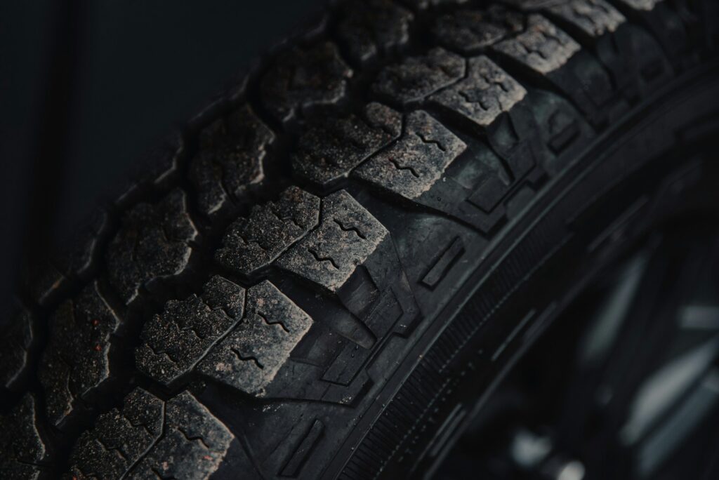 Black tire on black surface — illustrative photography
